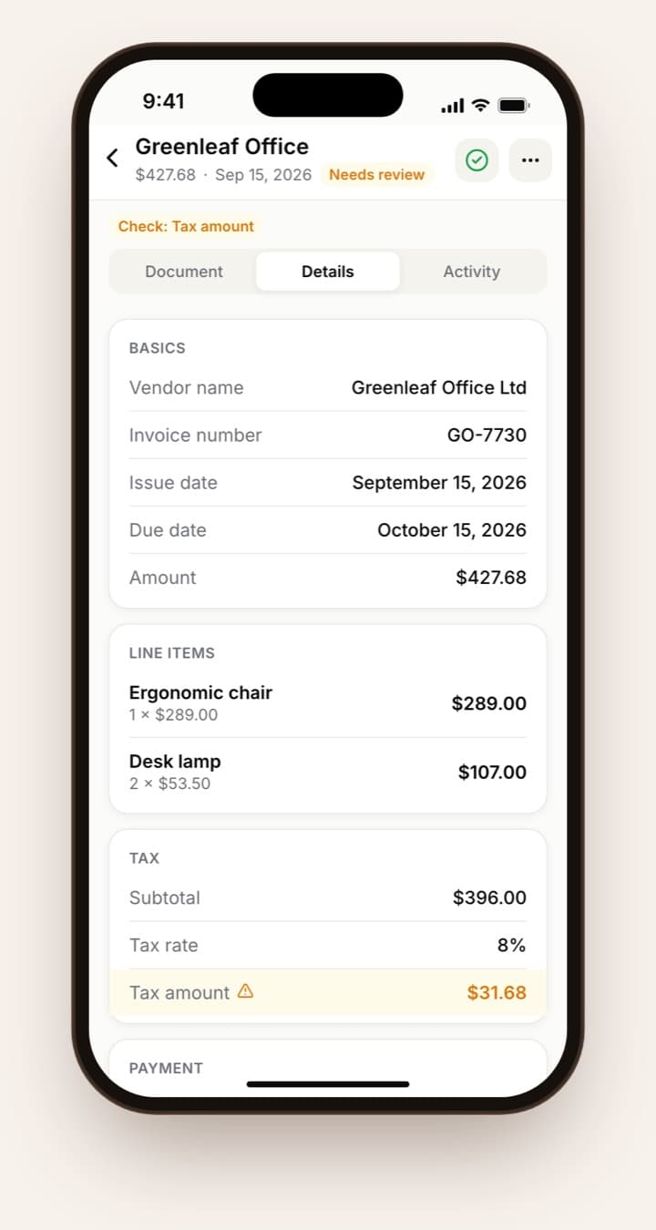 Invoice details with vendor, line items and a tax amount flagged for review